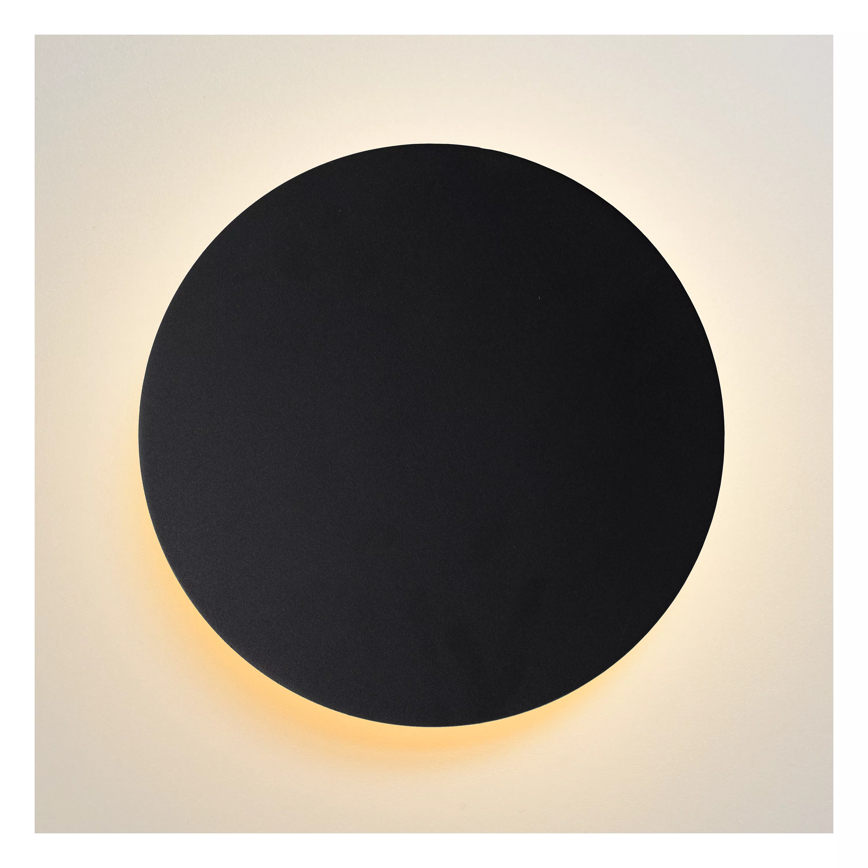 Nástěnné svítidlo Eklyps vytvoří na stěně kruhovou záři, k dostání v černém provedení.