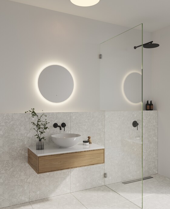 Nástěnné svítidlo Nordlux Dovina Round je díky vysokému krytí ideální do koupelny. Toto koupelnové zrcadlo tvoří podsvícení na stěně. Dostupné v průhledné variantě.