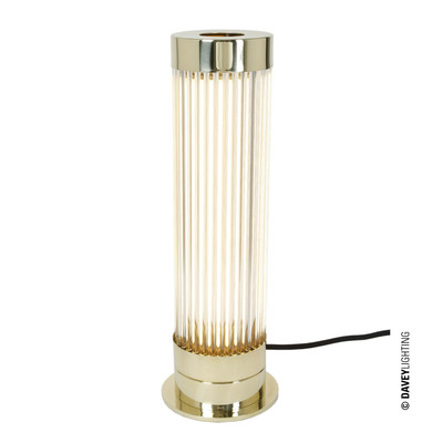 Stolní lampička Pillar od Original BTC. Čiré skleněné trubice. Základna a vršek kov. Art Deco styl, vhodná do ložnice, koupelny i salonku.