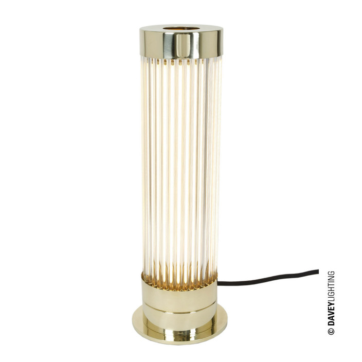 Stolní lampička Pillar od Original BTC. Čiré skleněné trubice. Základna a vršek kov. Art Deco styl, vhodná do ložnice, koupelny i salonku. (leštěná mosaz)